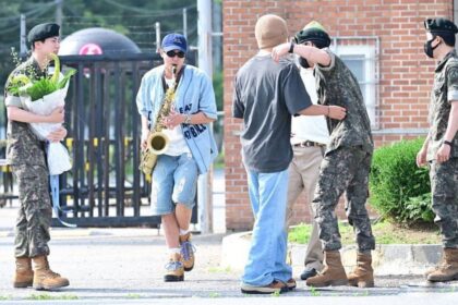 Jin says he didn’t realize RM was playing the saxophone next to him when he was being discharged